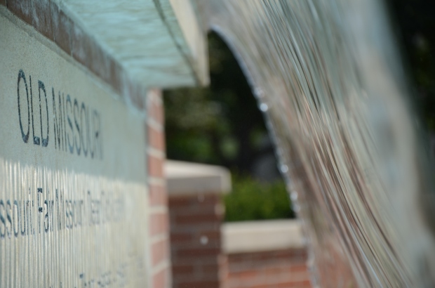 "Old Missouri" -- Mizzou's alma mater -- is engraved behind the fountain's waterfall. Hidden behind the water and below the bronze tiger, these words are often overlooked. -- Ryan Levi/2014